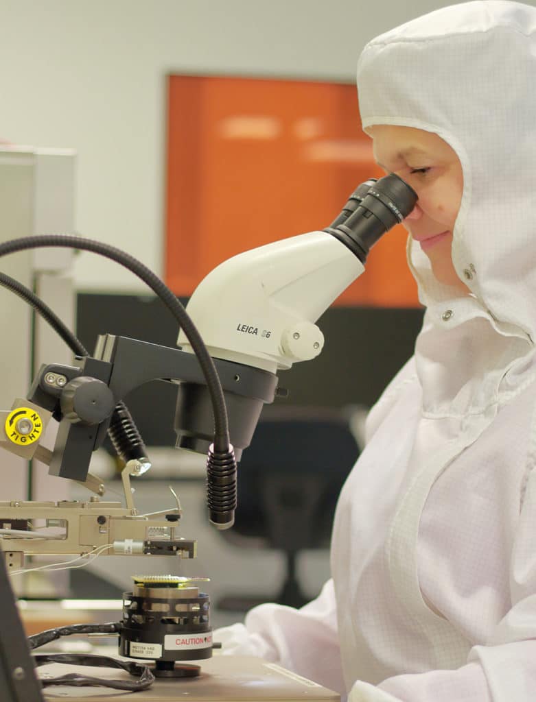 An engineer working on a semiconductor chip